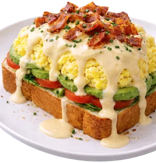 Benedictinos Claus Style: huevos revueltos sobre pan brioche con salsa holandesa y bacon