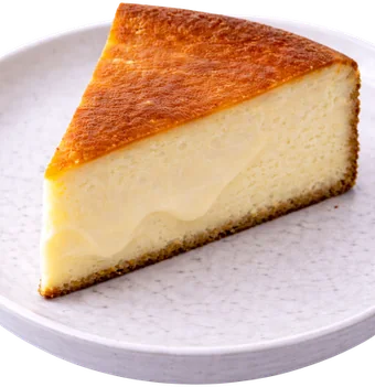 Porción de tarta de queso artesanal, la especialidad de Claus Bakery Málaga